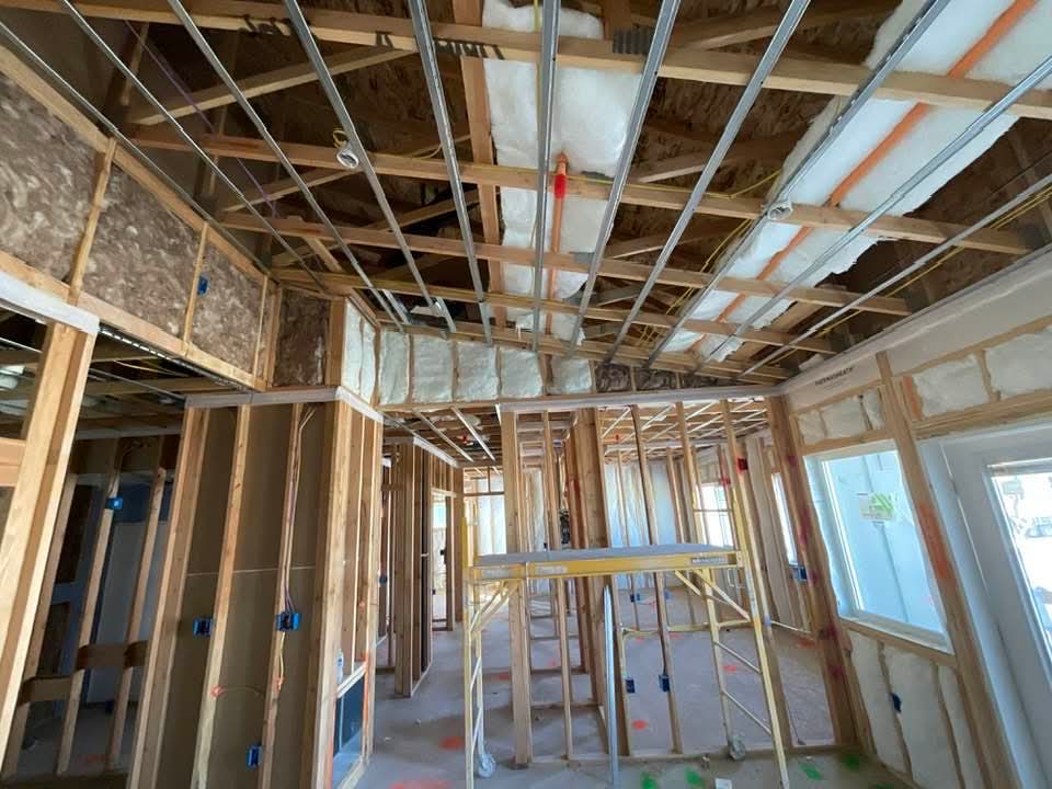 Interior ceiling framing with metal furring channels — pre-drywall phase